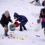 Children hunt for Easter eggs during the Easter Eggstravaganza at Nikiski Community Recreation Center in Nikiski, Alaska, on Saturday, March 23, 2024. (Jake Dye/Peninsula Clarion)