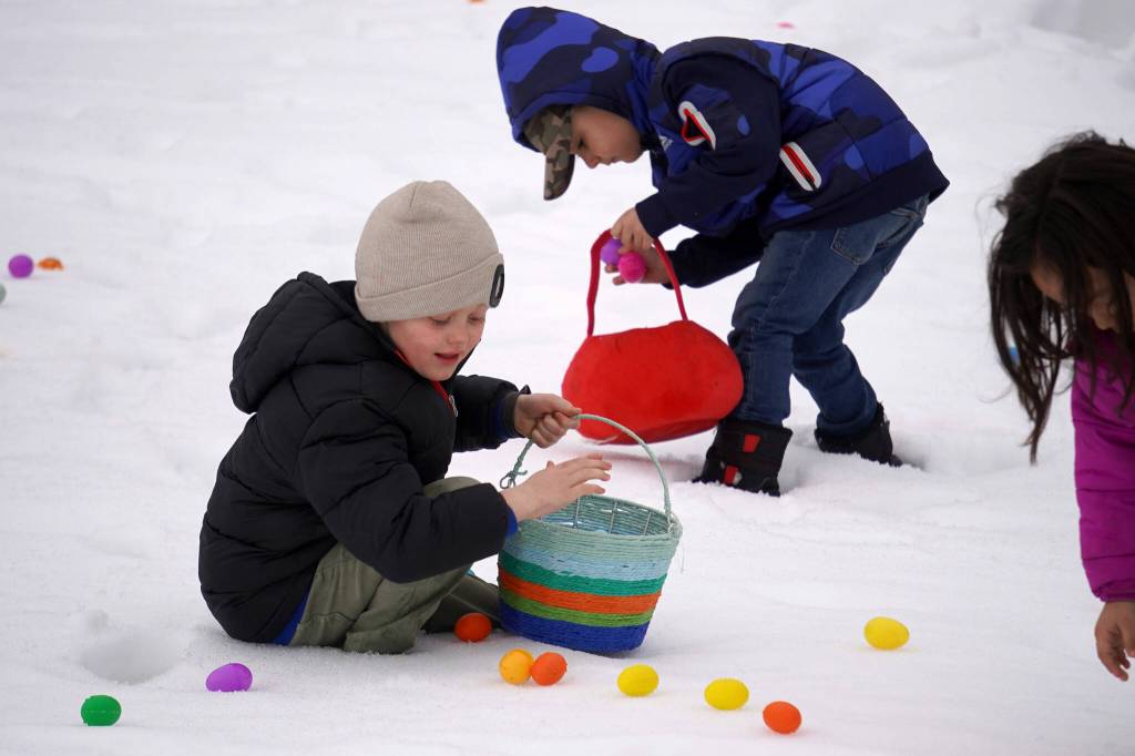 Children hunt for Easter eggs during the Easter Eggstravaganza at Nikiski Community Recreation Center in Nikiski, Alaska, on Saturday, March 23, 2024. (Jake Dye/Peninsula Clarion)