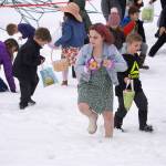 Children hunt for Easter eggs during the Easter Eggstravaganza at Nikiski Community Recreation Center in Nikiski, Alaska, on Saturday, March 23, 2024. (Jake Dye/Peninsula Clarion)
