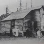What are almost certainly members of the Grönroos family pose in front of their Anchor Point home in this undated photograph from the Clendenen family section in In Those Days, a book about pioneers of the southern Kenai Peninsula. The cabin was built in about 1903-04 just north of the mouth of the Anchor River.