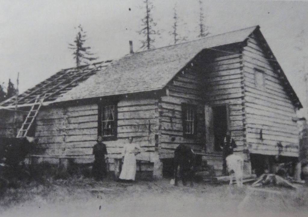 What are almost certainly members of the Grönroos family pose in front of their Anchor Point home in this undated photograph from the Clendenen family section in In Those Days, a book about pioneers of the southern Kenai Peninsula. The cabin was built in about 1903-04 just north of the mouth of the Anchor River.