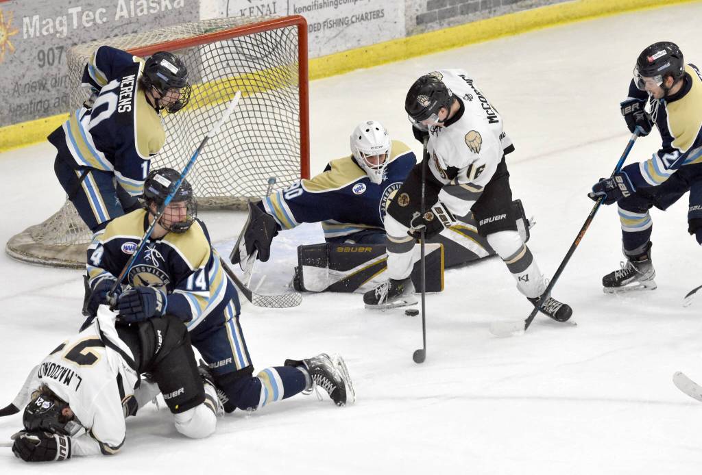 Carter McCormick of the Kenai River Brown Bears cant stuff a goal past Janesville (Wisconsin) Jets goalie Jan Kasal on Sunday, March 31, 2024, at the Soldotna Regional Sports Complex in Soldotna, Alaska. (Photo by Jeff Helminiak/Peninsula Clarion)