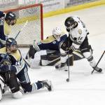 Carter McCormick of the Kenai River Brown Bears can't stuff a goal past Janesville (Wisconsin) Jets goalie Jan Kasal on Sunday, March 31, 2024, at the Soldotna Regional Sports Complex in Soldotna, Alaska. (Photo by Jeff Helminiak/Peninsula Clarion)