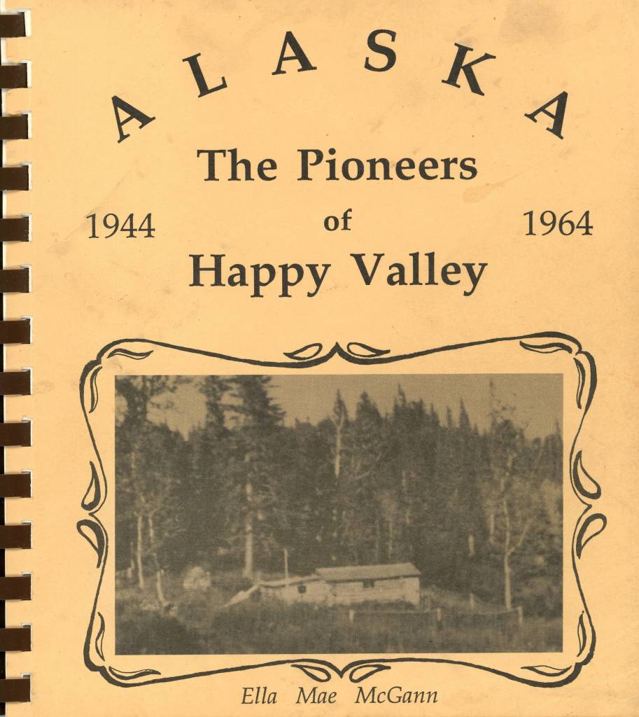 The cover of Ella Mae McGanns history book, The Pioneers of Happy Valley, 1944-1964, shows the original homesteading cabin of Homer and Nell Crosby. (Cover image courtesy of Adrienne Walli Sweeney)