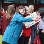 Rep. Alyse Galvin, an Anchorage independent, takes a photo with Meadow Stanley, a senior at Juneau-Douglas High School: Yadaa.at Kalé on Thursday morning before they took part in a protest march from the school to the Alaska State Capitol. (Mark Sabbatini / Juneau Empire)