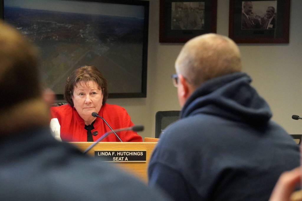 Linda Hutchings asks questions of Keith Pieh, a member of the Soldotna Little League board, during a Soldotna City Council meeting in Soldotna, Alaska, on Wednesday, April 10, 2024. (Jake Dye/Peninsula Clarion)