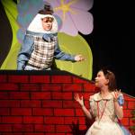 Riley Hinton is Humpty Dumpty and Aurora Bukac is Alice in a rehearsal of Seward High School Theatre Collectives production of Alice in Wonderland at Seward High School in Seward, Alaska, on Thursday, April 11, 2024. (Jake Dye/Peninsula Clarion)