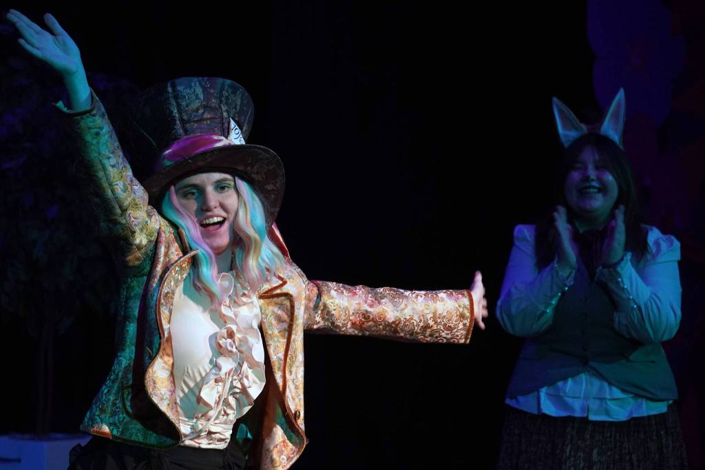 Lily Mooter is Hatter and Lily Biocic is March Hare in a rehearsal of Seward High School Theatre Collectives production of Alice in Wonderland at Seward High School in Seward, Alaska, on Thursday, April 11, 2024. (Jake Dye/Peninsula Clarion)