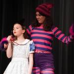 Aurora Bukac is Alice and Lily Miles-Dafoe is the Cheshire Cat in a rehearsal of Seward High School Theatre Collectives production of Alice in Wonderland at Seward High School in Seward, Alaska, on Thursday, April 11, 2024. (Jake Dye/Peninsula Clarion)