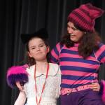 Aurora Bukac is Alice and Lily Miles-Dafoe is the Cheshire Cat in a rehearsal of Seward High School Theatre Collectives production of Alice in Wonderland at Seward High School in Seward, Alaska, on Thursday, April 11, 2024. (Jake Dye/Peninsula Clarion)
