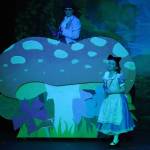 Evelyn Bukac is Blue Caterpillar and Aurora Bukac is Alice in a rehearsal of Seward High School Theatre Collectives production of Alice in Wonderland at Seward High School in Seward, Alaska, on Thursday, April 11, 2024. (Jake Dye/Peninsula Clarion)