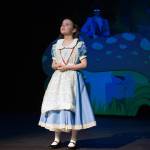 Aurora Bukac is Alice and Evelyn Bukac is Blue Caterpillar in a rehearsal of Seward High School Theatre Collectives production of Alice in Wonderland at Seward High School in Seward, Alaska, on Thursday, April 11, 2024. (Jake Dye/Peninsula Clarion)