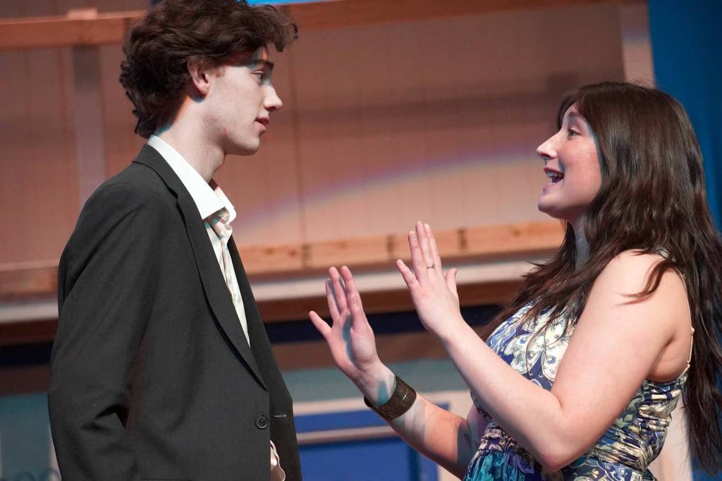 Kyler Allen and Leora McCaughey rehearse Mamma Mia at Nikiski Middle/High School in Nikiski, Alaska, on Tuesday, April 16, 2024. (Jake Dye/Peninsula Clarion)