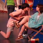 Oshie Broussard, right, and the cast of Nikiski Bulldog Theaters Mamma Mia rehearse at Nikiski Middle/High School in Nikiski, Alaska, on Tuesday, April 16, 2024. (Jake Dye/Peninsula Clarion)