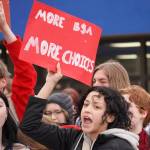 Laylani Williams joins other students of Soldotna High School as they stage a walkout in protest of the veto of Senate Bill 140 in front of their school in Soldotna, Alaska, on Wednesday, April 17, 2024. (Jake Dye/Peninsula Clarion)