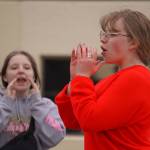 JLee Webster leads students of Soldotna High School in a chant during a walkout in protest of the veto of Senate Bill 140 in front of their school in Soldotna, Alaska, on Wednesday, April 17, 2024. (Jake Dye/Peninsula Clarion)