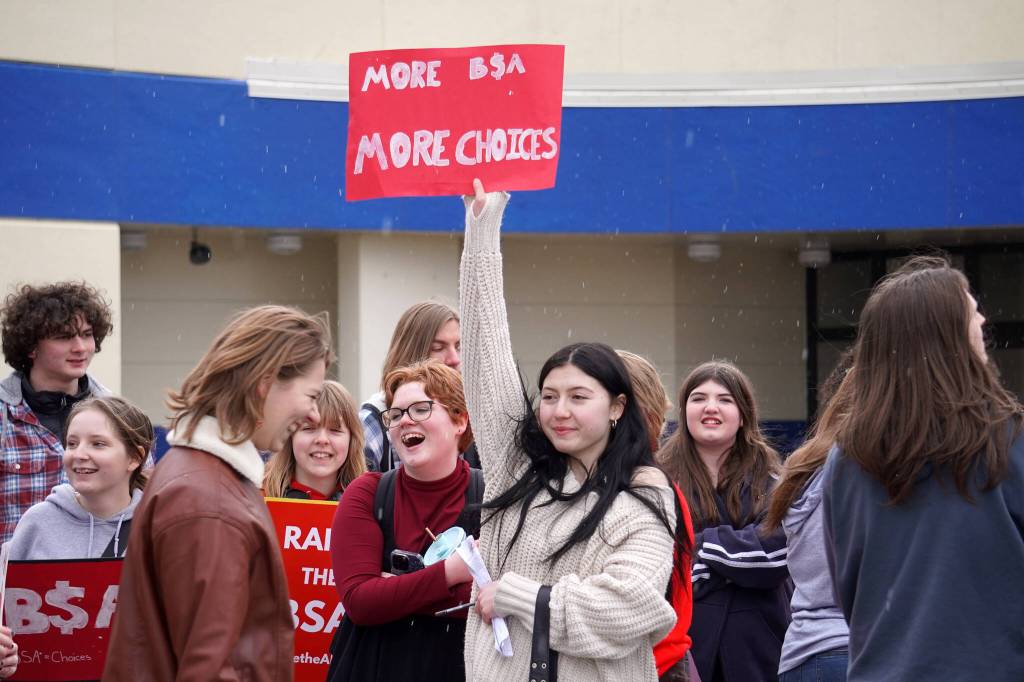 Students of Soldotna High School stage a walkout in protest of the veto of Senate Bill 140 in front of their school in Soldotna, Alaska, on Wednesday, April 17, 2024. (Jake Dye/Peninsula Clarion)