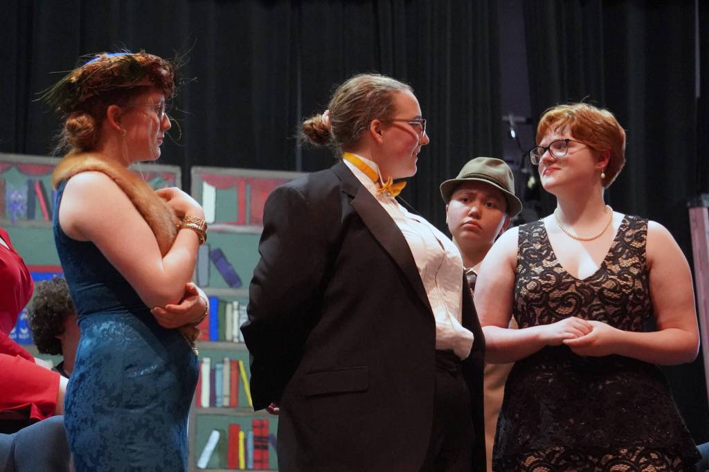 Emerson Kapp, Leihla Harrison, Chloe Jacko and Ada Bon rehearse Clue at Soldotna High School in Soldotna, Alaska, on Thursday, April 18, 2024. (Jake Dye/Peninsula Clarion)