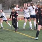 Homers Minadora Reutov (6) celebrates her goal against Kenai Central on Tuesday, April 16, 2024, at Ed Hollier Field at Kenai Central High School in Kenai, Alaska. (Photo by Jeff Helminiak/Peninsula Clarion)