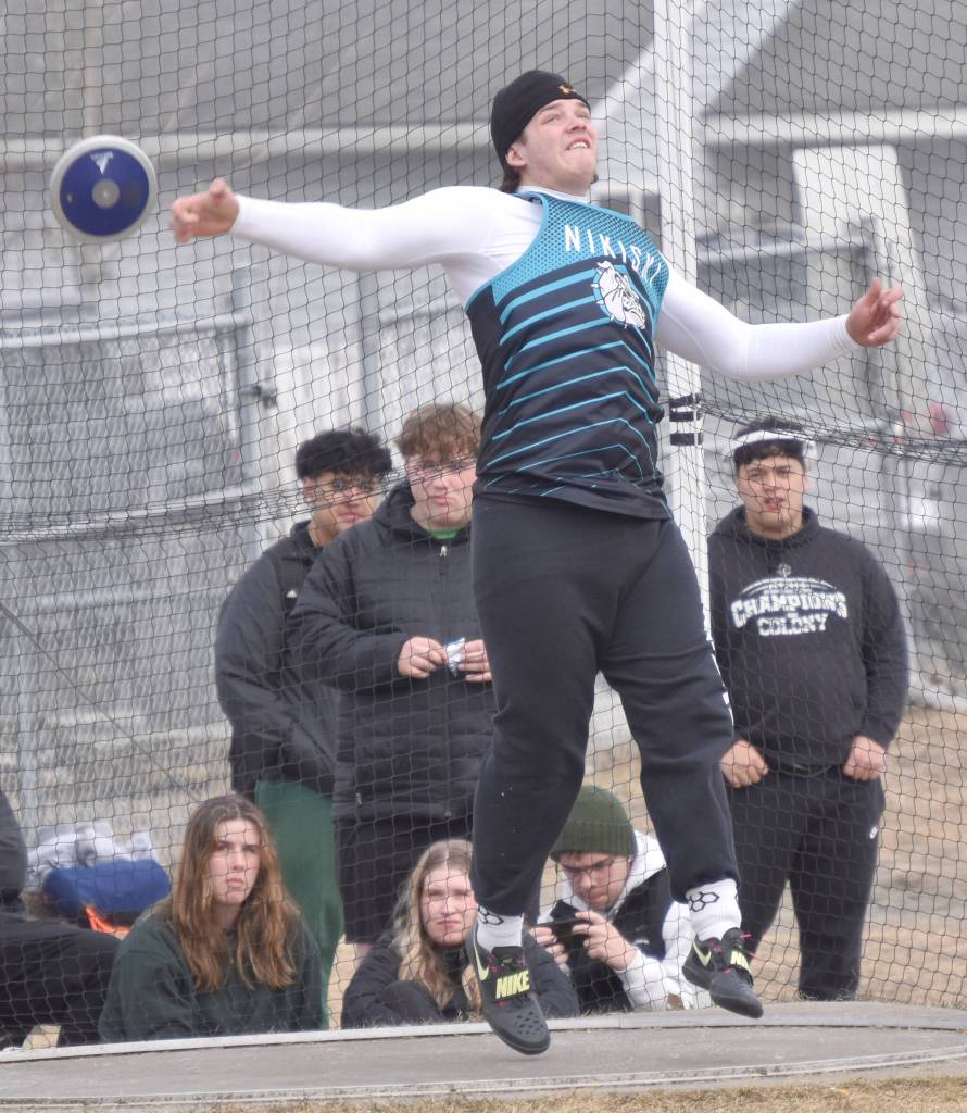 Nikiskis Truit McCaughey competes in the discus Saturday, April 20, 2024, at the Soldotna Invitational at Soldotna High School in Soldotna, Alaska. (Photo by Jeff Helminiak/Peninsula Clarion)