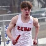 Kenai Central's Greg Fallon runs in the 1,600-meter relay Saturday, April 20, 2024, at the Soldotna Invitational at Soldotna High School in Soldotna, Alaska. (Photo by Jeff Helminiak/Peninsula Clarion)