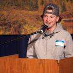 Rylan Broyles presents his idea for recycling plastic beach debris into fishing equipment to a panel of judges in the 34th Annual Caring for the Kenai Competition at Kenai Central High School in Kenai, Alaska, on Thursday, April 18, 2024. (Jake Dye/Peninsula Clarion)