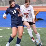 Kenai Centrals Sarah Baisden dribbles against Soldotnas Anika Jedlicka on Tuesday, April 23, 2024, at Soldotna High School in Soldotna, Alaska. (Photo by Jeff Helminiak/Peninsula Clarion)