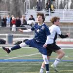 Soldotnas Daniel Heath and Kenai Centrals Aloshia Cross battle for the ball Tuesday, April 23, 2024, at Soldotna High School in Soldotna, Alaska. (Photo by Jeff Helminiak/Peninsula Clarion)