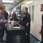 Oliver Trobaugh speaks to representatives of Bear Creek Volunteer Fire Department during Career Day at Seward High School in Seward on Wednesday. (Jake Dye/Peninsula Clarion)
