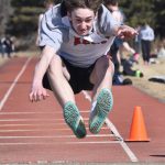 Kenai Centrals Hayden Hughes finishes third in the long jump Saturday, April 27, 2024, at the Kenai Invitational at Kenai Central High School in Kenai, Alaska. (Photo by Jeff Helminiak/Peninsula Clarion)
