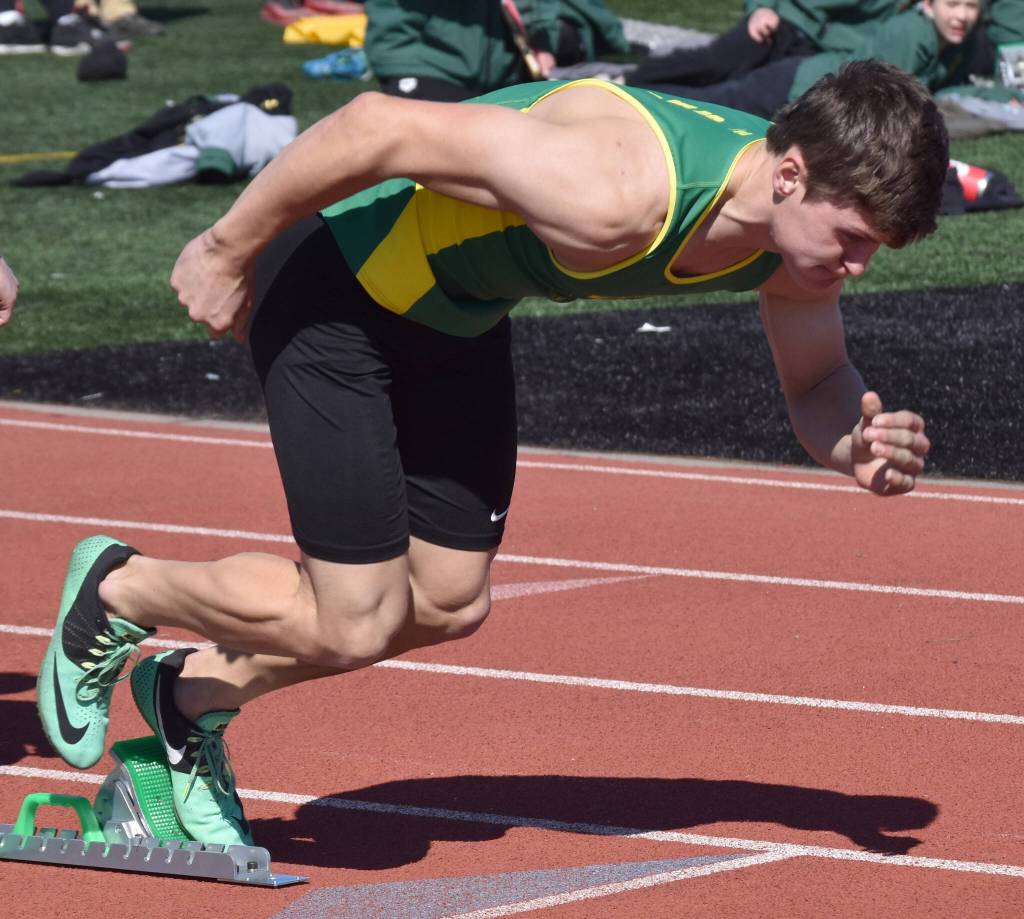 Sewards Gideon Schrock finishes third in the 400 meters Saturday, April 27, 2024, at the Kenai Invitational at Kenai Central High School in Kenai, Alaska. (Photo by Jeff Helminiak/Peninsula Clarion)