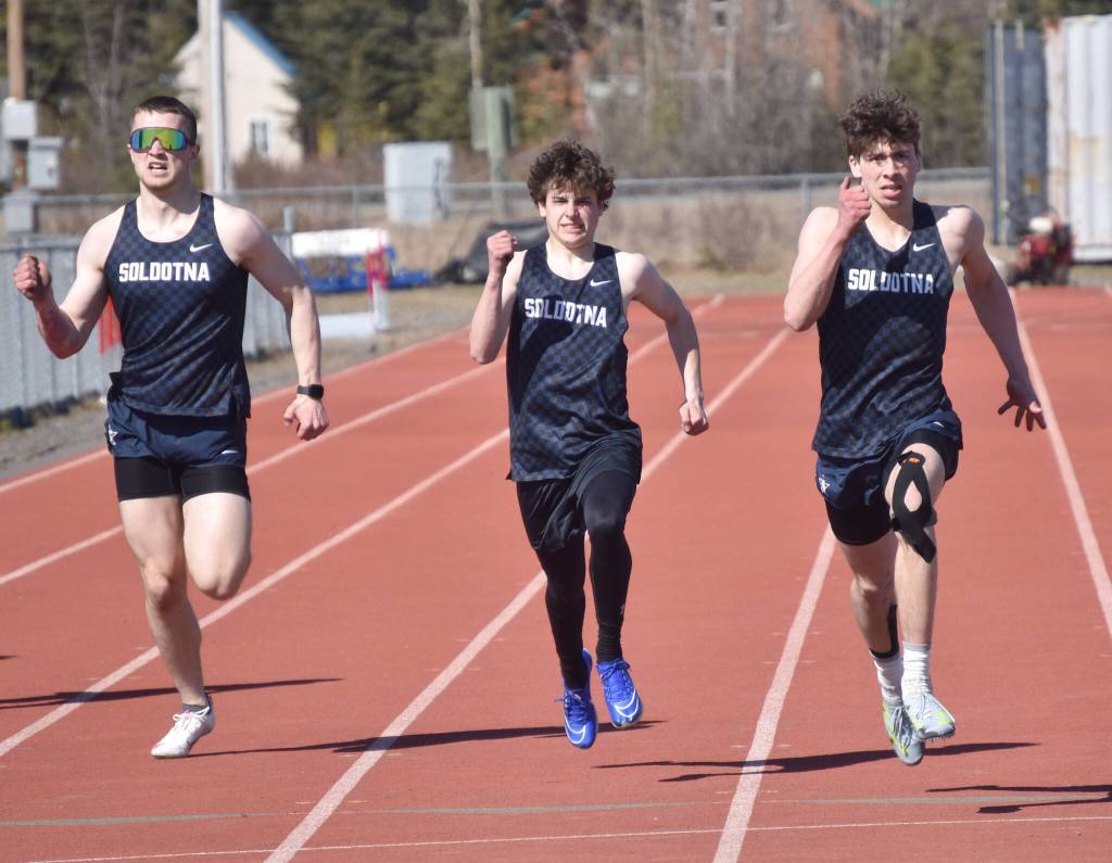 Soldotnas Leigh Tacey II (right) wins the 200 meters Saturday, April 27, 2024, at the Kenai Invitational at Kenai Central High School in Kenai, Alaska. (Photo by Jeff Helminiak/Peninsula Clarion)