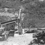 Photo from Snapshot at Statehood, by the Kenai Peninsula Historical Association
Two unidentified women pose near Rex Hanks sawmill operation near the mouth of Happy Creek, circa 1950.