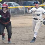 Kenai Centrals Avery Ellis tries to elude Soldotnas Alyssa McDonald in a rundown Tuesday, April 30, 2024, at the Soldotna Little League fields in Soldotna, Alaska. (Photo by Jeff Helminiak/Peninsula Clarion)