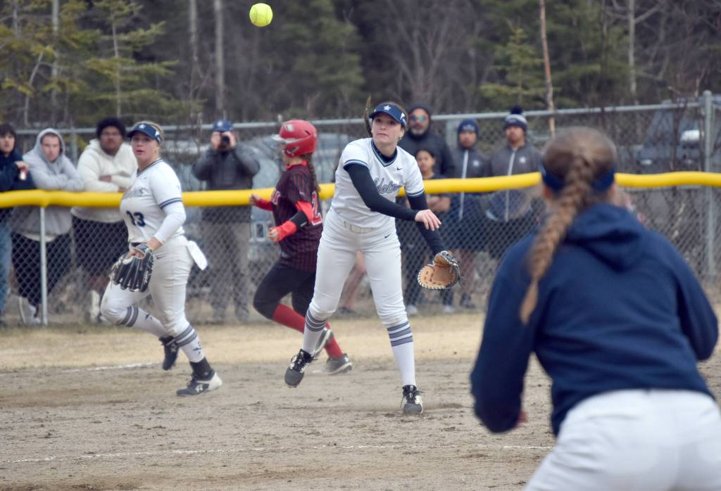 Soldotna third baseman Juliet Innes throws to first Tuesday, April 30, 2024, at the Soldotna Little League fields in Soldotna, Alaska. (Photo by Jeff Helminiak/Peninsula Clarion)