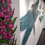 Art by Chelline Larsen and Adam Hoyt, for Stitch, Paint, Fabricate, fills the walls of the Kenai Art Center in Kenai, Alaska, on Wednesday, May 1, 2024. (Jake Dye/Peninsula Clarion)