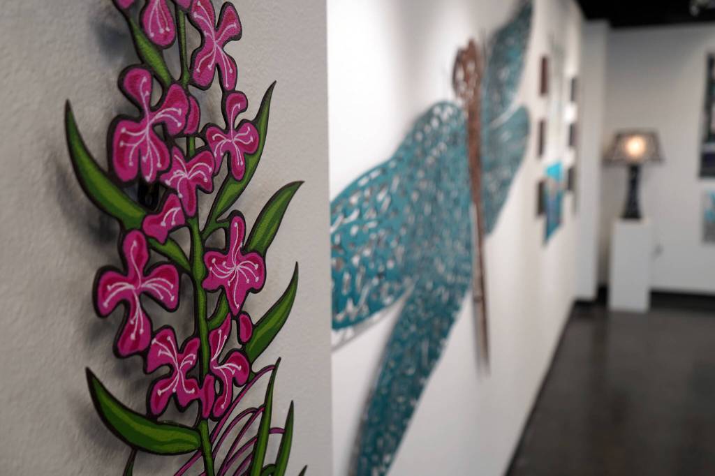 Art by Chelline Larsen and Adam Hoyt, for Stitch, Paint, Fabricate, fills the walls of the Kenai Art Center in Kenai, Alaska, on Wednesday, May 1, 2024. (Jake Dye/Peninsula Clarion)