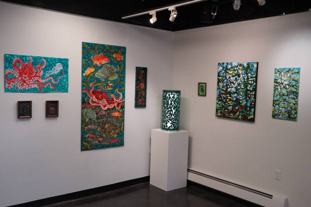 Art by Chelline Larsen and Adam Hoyt, for Stitch, Paint, Fabricate, fills the walls of the Kenai Art Center in Kenai, Alaska, on Wednesday, May 1, 2024. (Jake Dye/Peninsula Clarion)