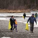 Jake Dye/Peninsula Clarion
Students of Soldotna Montessori Charter School comb for trash along the banks of the Kenai River at Centennial Park in Soldotna on Thursday.