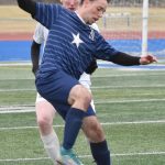 Soldotnas Nuno Venturi dribbles against Ketchikans Soren Evison on Thursday, May 2, 2024, at Soldotna High School in Soldotna, Alaska. (Photo by Jeff Helminiak/Peninsula Clarion)