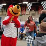 Scoop greets attendees of the Sport, Rec and Trade Show at the Soldotna Regional Sports Complex in Soldotna, Alaska, on Saturday, May 4, 2024. (Jake Dye/Peninsula Clarion)