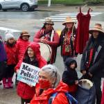 Red clothing is worn and displayed as a sign of a unified call for action during a rally in front of the Alaska State Capitol on Sunday, May 5, 2024, to commemorate the annual Missing and Murdered Indigenous Persons Awareness Day. (Mark Sabbatini / Juneau Empire)