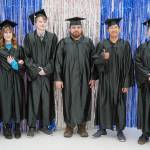 Graduates of Kenai Peninsula College gather for photos before the 54th Annual Kenai Peninsula College Commencement Ceremony at Kenai Central High School in Kenai, Alaska, on Thursday, May 9, 2024. (Jake Dye/Peninsula Clarion)