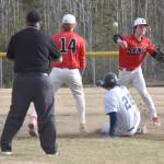 Kenai Central shortstop Braden Smith throws to first base Tuesday, May 7, 2024, at the Soldotna Little League fields in Soldotna, Alaska. (Photo by Jeff Helminiak/Peninsula Clarion)
