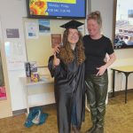 2024 graduate Mercedes Becker and KPC staff member Jill Burnham pose before the commencement event at the Kachemak Bay Campus, May 8, 2024, in Homer, Alaska. (Emilie Springer/ Homer News)