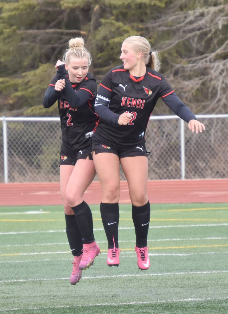 Kenai Centrals Brynnen Hanson celebrates her goal with Kate Wisnewski on Thursday, May 9, 2024, at Kenai Central High School in Kenai, Alaska. (Photo by Jeff Helminiak/Peninsula Clarion)