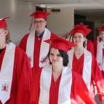 Graduates of Kenai Central High School proceed into the schools auditorium in Kenai, Alaska, on Monday, May 13, 2024. (Jake Dye/Peninsula Clarion)