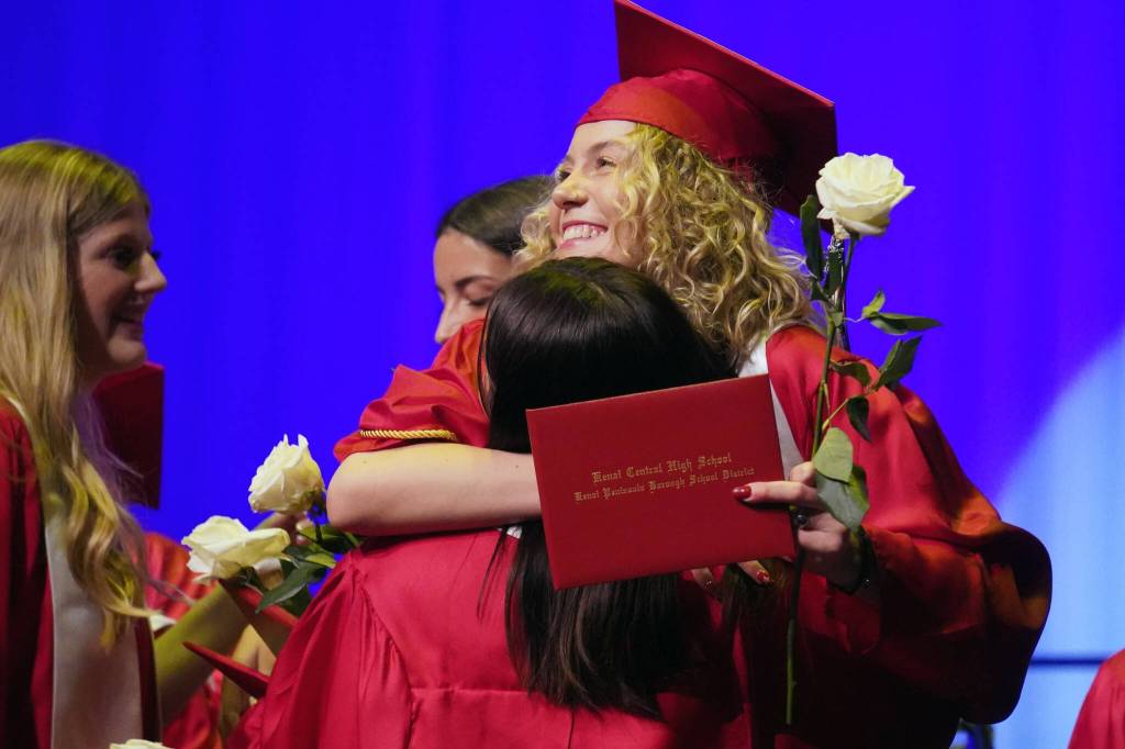 Students of Kenai Central High School celebrate at the end of their graduation ceremony in the schools auditorium in Kenai, Alaska, on Monday, May 13, 2024. (Jake Dye/Peninsula Clarion)