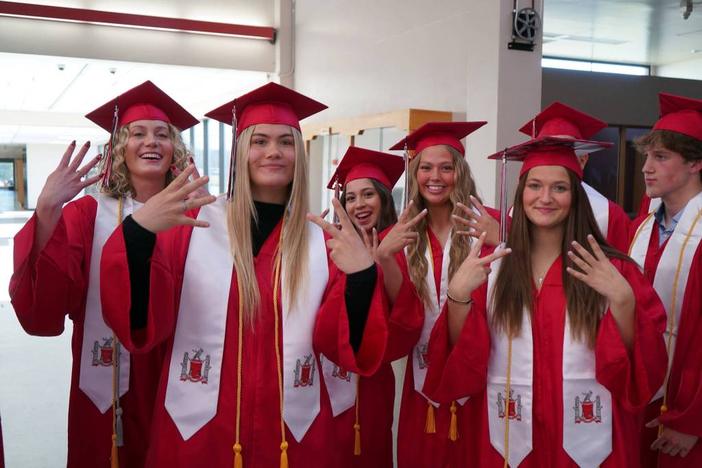 Graduates of Kenai Central High School proceed into the schools auditorium in Kenai, Alaska, on Monday, May 13, 2024. (Jake Dye/Peninsula Clarion)