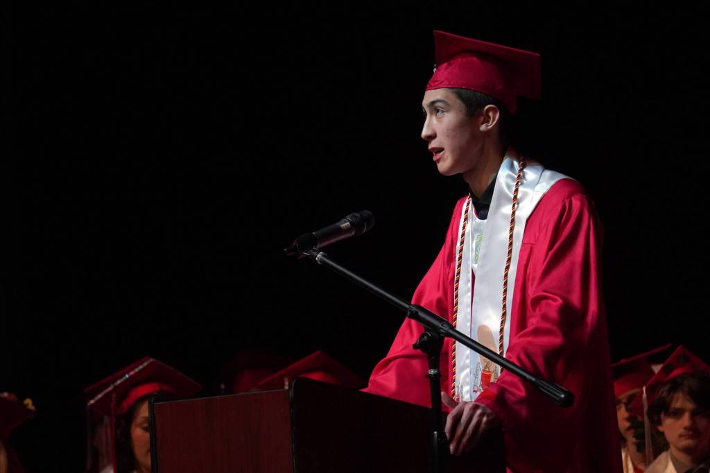 Valedictorian Robert Carson speaks to his fellow students at their graduation ceremony at Kenai Central High School in Kenai, Alaska, on Monday, May 13, 2024. (Jake Dye/Peninsula Clarion)